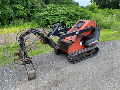 ditch witch attachment for skid steer|mini skid steer grapple attachment.